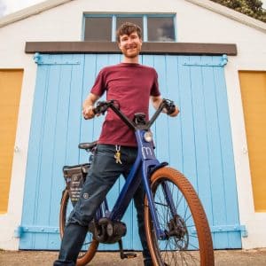 Ryan co-founder on ebike equiped with GPS tracker